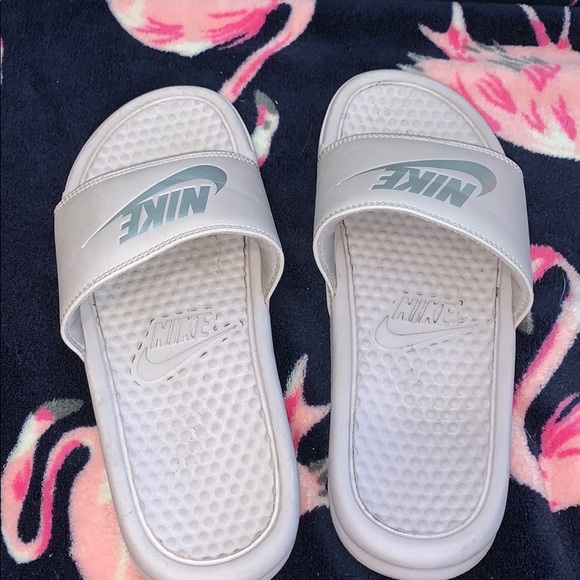 Nike Shoes - Pink nike slides with silver decal Nike Shoes - Pink nike slides with silver decal